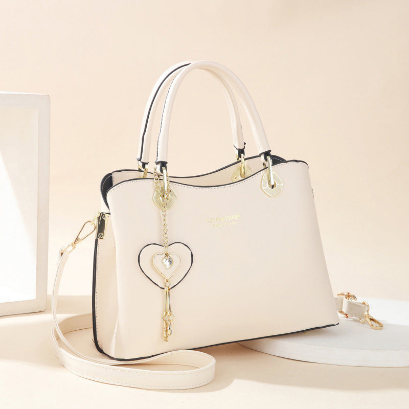 Élégant sac fourre-tout pour femme avec breloque en forme de cœur brillant